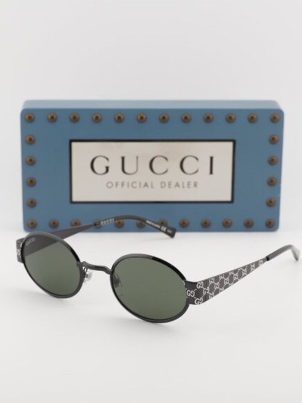 Gucci GG1854S 001 Oval Sunglasses – Ruthenium/Grey